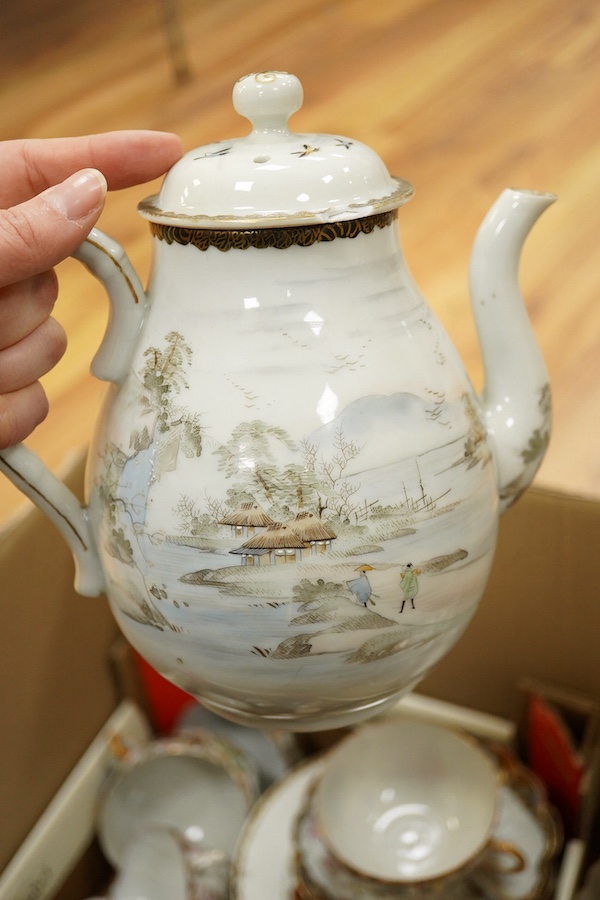 A Japanese eggshell tea and coffee set and three Chinese blue and white seal paste boxes and covers